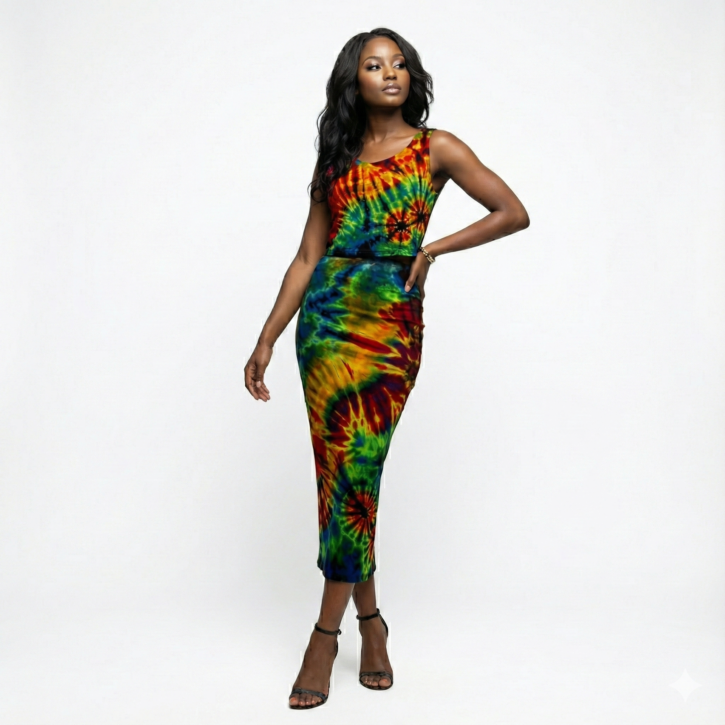 Woman wearing a tie-dye 2 pc set on a white background