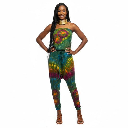 Woman wearing a colorful tie-dye jumpsuit on a white background