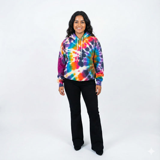 Person wearing a tie-dye hoodie on a white background