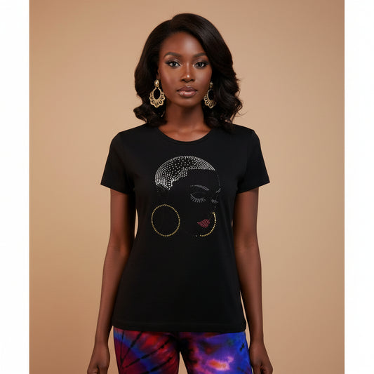 Black cotton t-shirt with a rhinestone Caesar cut woman's face design, red lips, and gold hoop earrings.