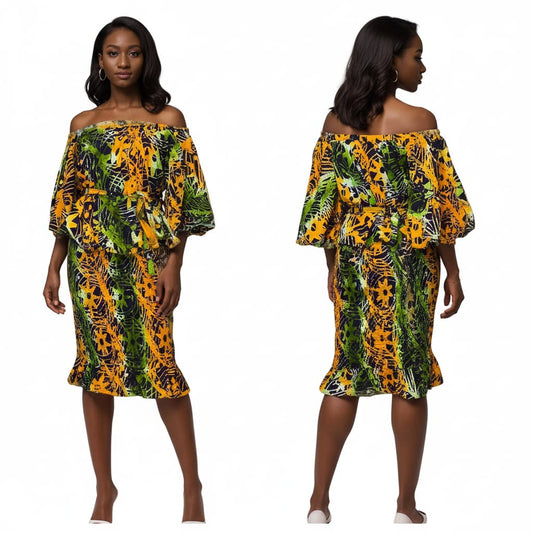 Woman wearing a colorful off-shoulder batik dress on a white background