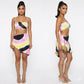 Woman wearing a colorful tie-dye skirt two piece skirt set strings to tie  on a white background