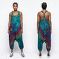 Person wearing a tie-dye harem  jumpsuit from front and back views on a white background