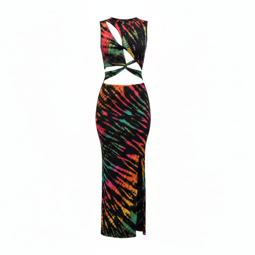 Woman wearing a tie dye cutout dress a white background