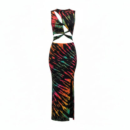 Woman wearing a tie dye cutout dress a white background