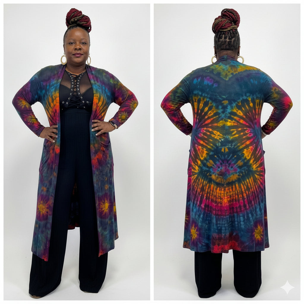 Person wearing a tie-dye long duster with a white background-sanjules