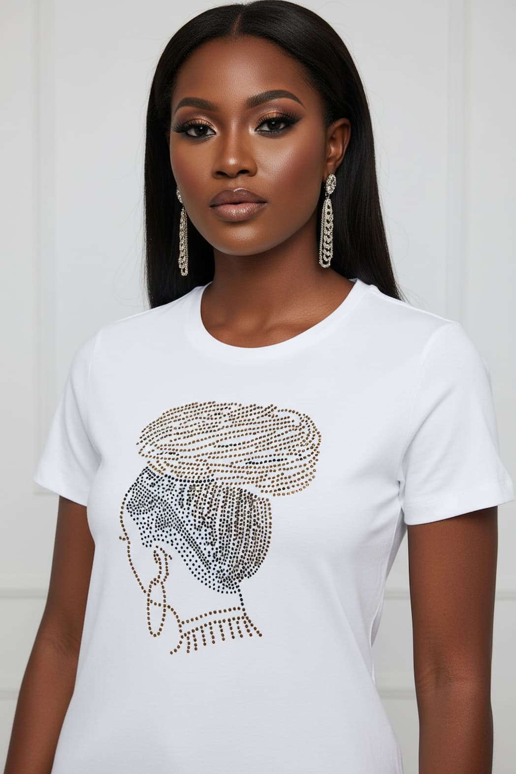 White fitted cap sleeve t-shirt with a dazzling rhinestone faux locs crown design.