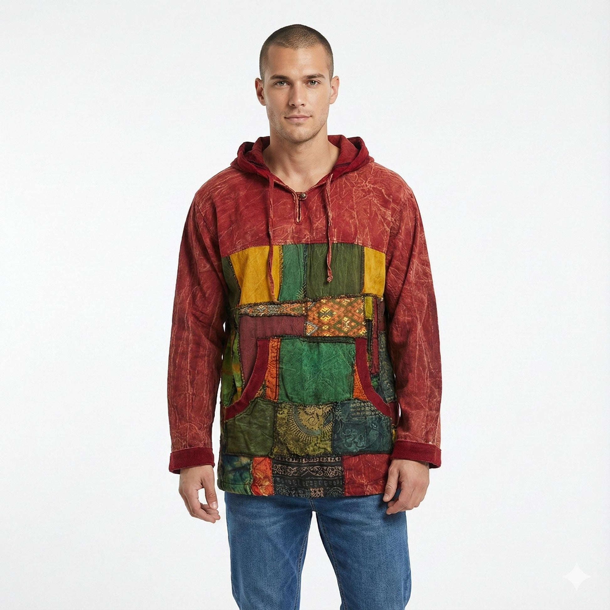 Man wearing a multicolored patchwork hoodie on a white background