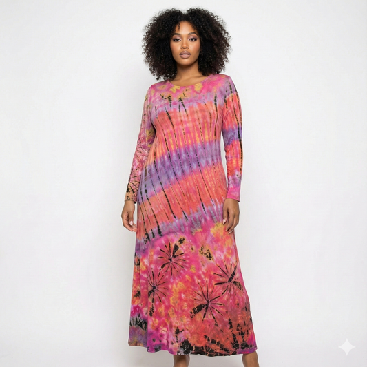 Woman wearing a tie-dye dress with pink, purple, and orange colors on a white background