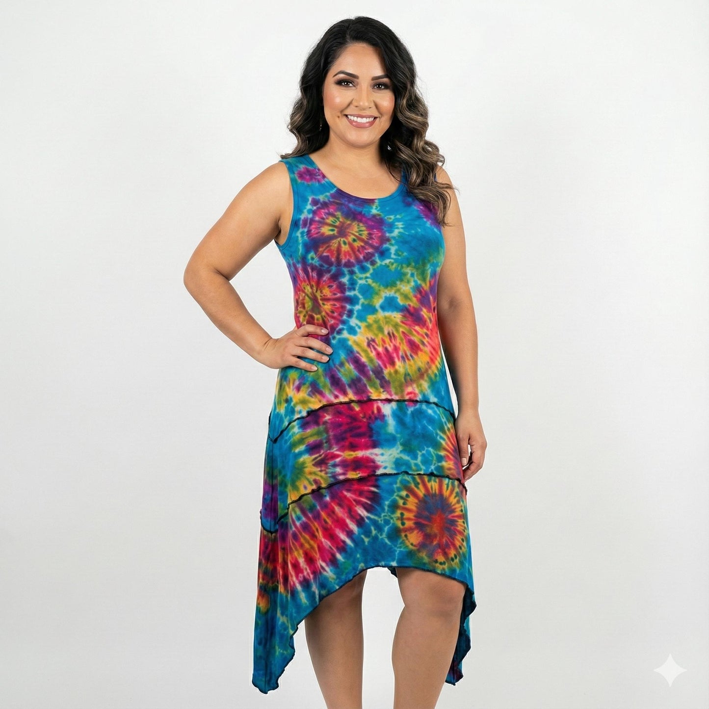 Woman wearing a colorful tie-dye dress on a white background