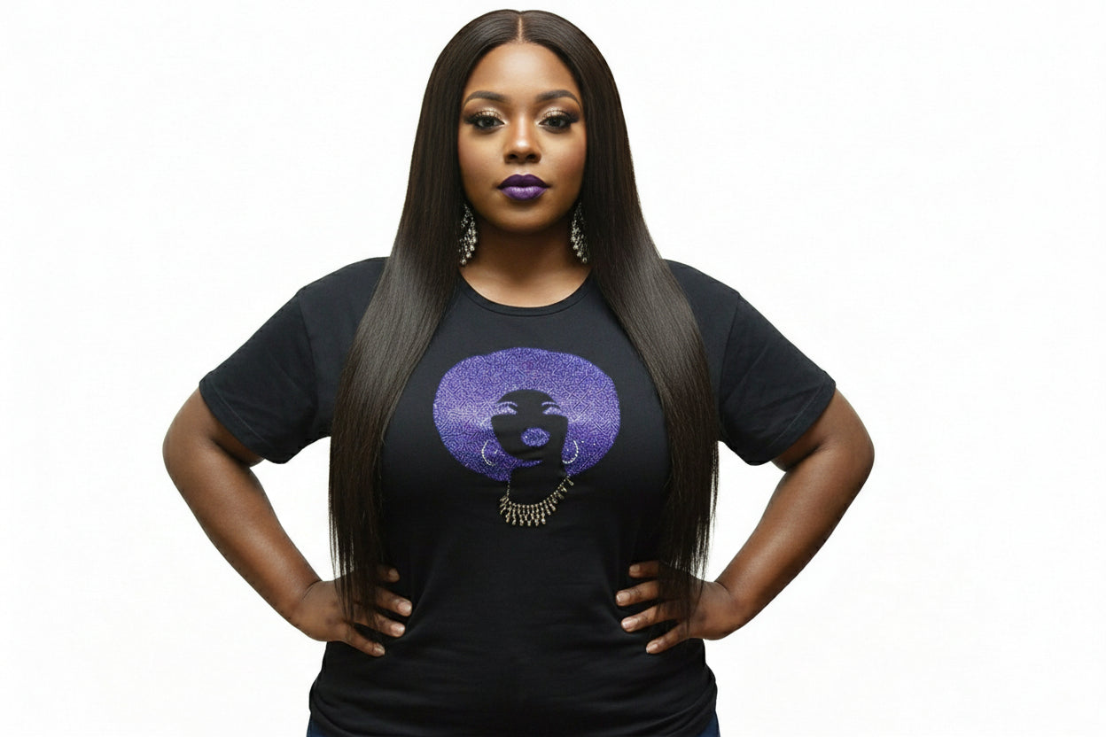 Woman wearing a black t-shirt with a royal blue rhinestone afro design and reflective film.