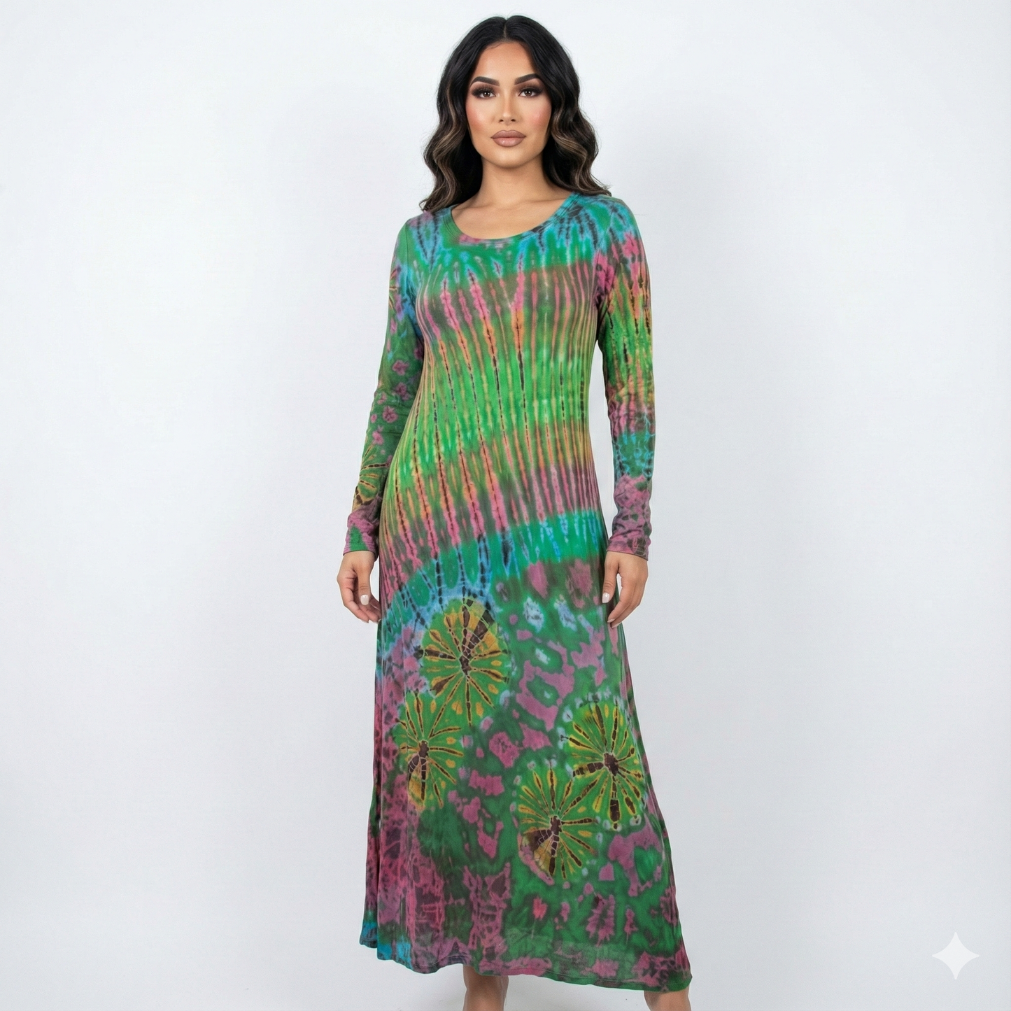 Woman wearing a tie-dye dress on a white background