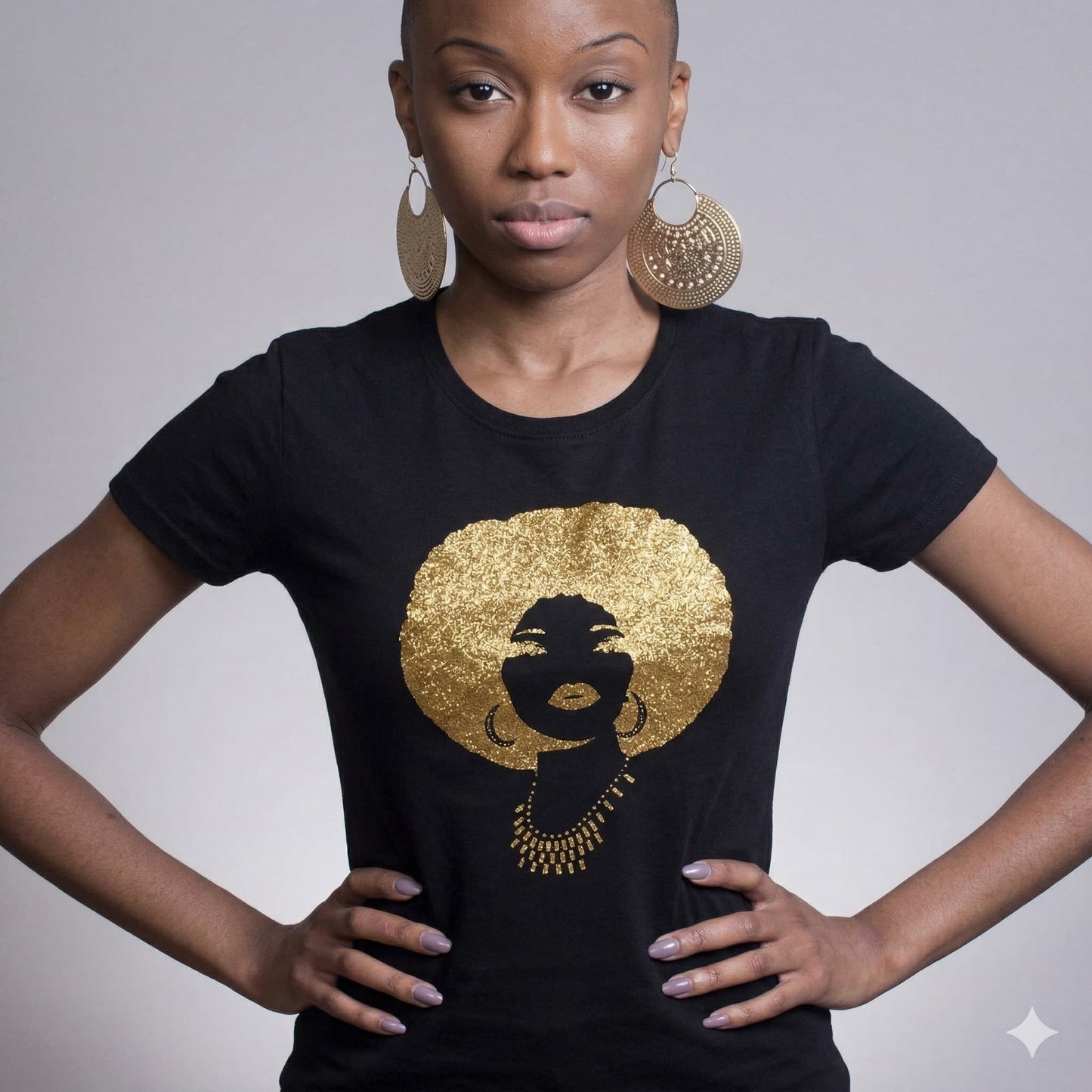 Black combed cotton tee with a sparkling gold rhinestone & reflective film Afro woman design.