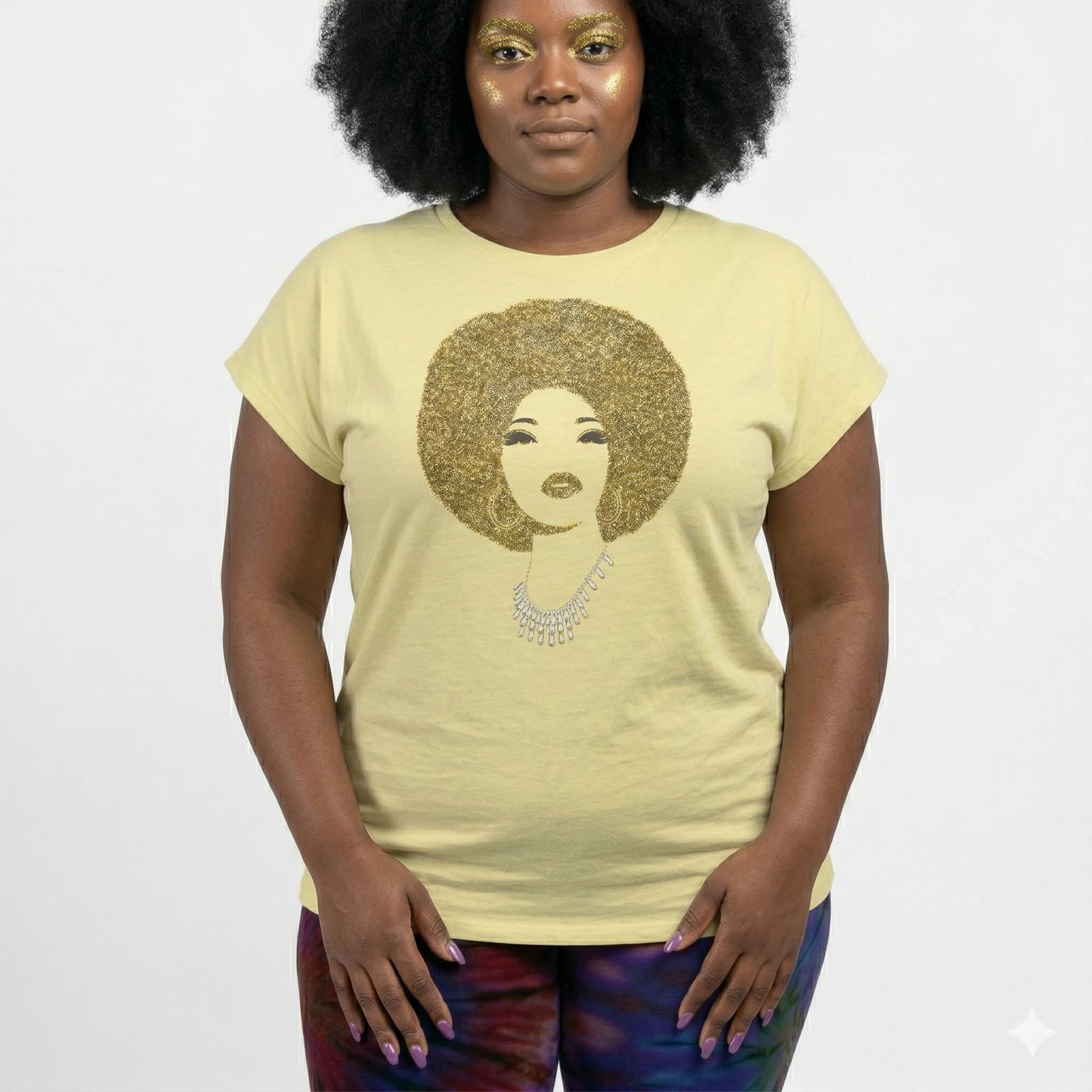 Light yellow combed cotton tee with a sparkling gold rhinestone Afro woman design.