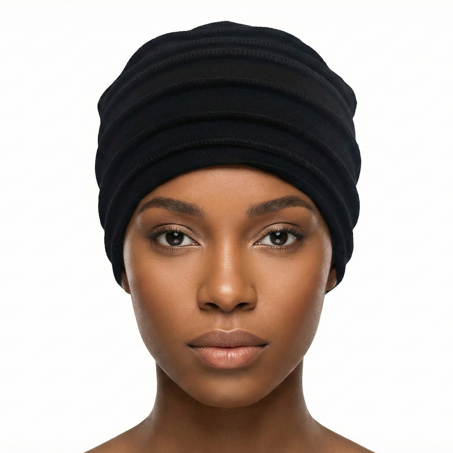 Woman wearing a black hat on a white background