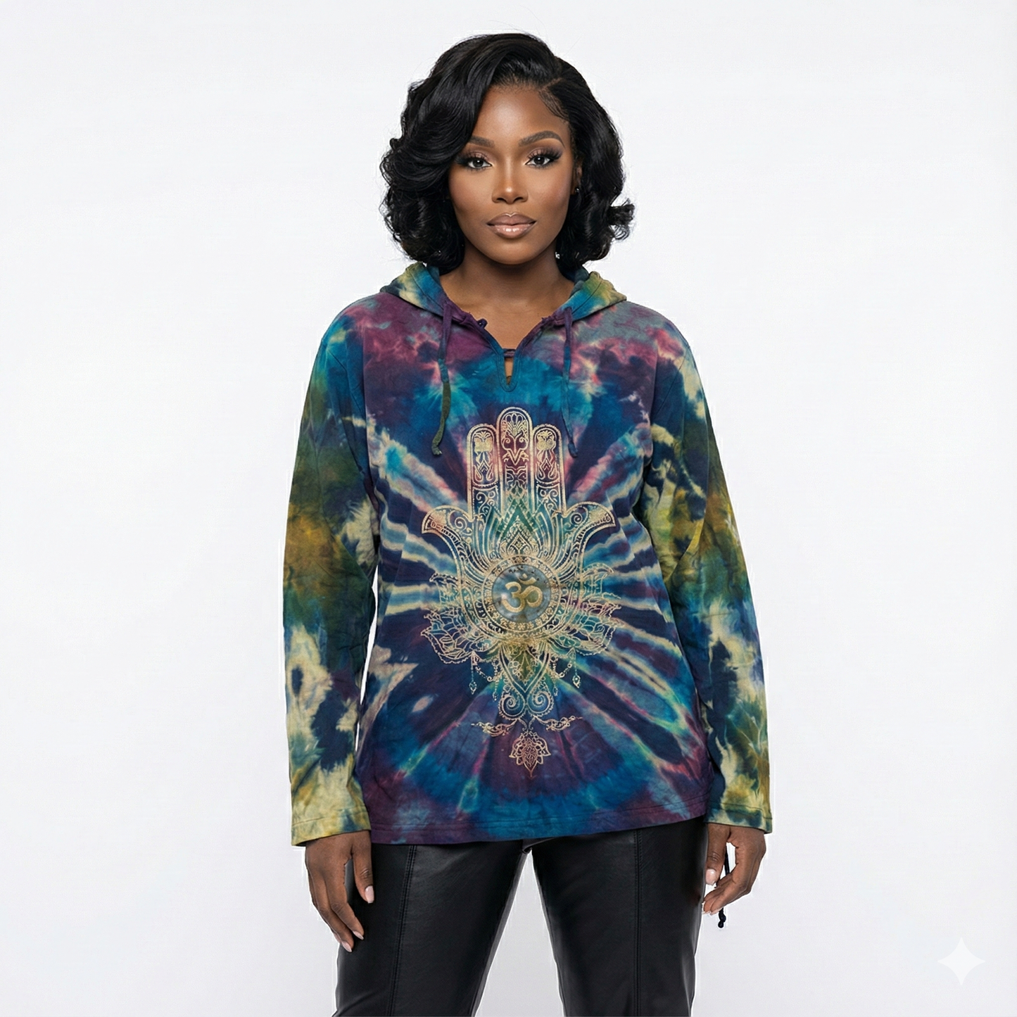 Woman wearing a tie-dye hoodie with a Hamsa hand design on a white background
