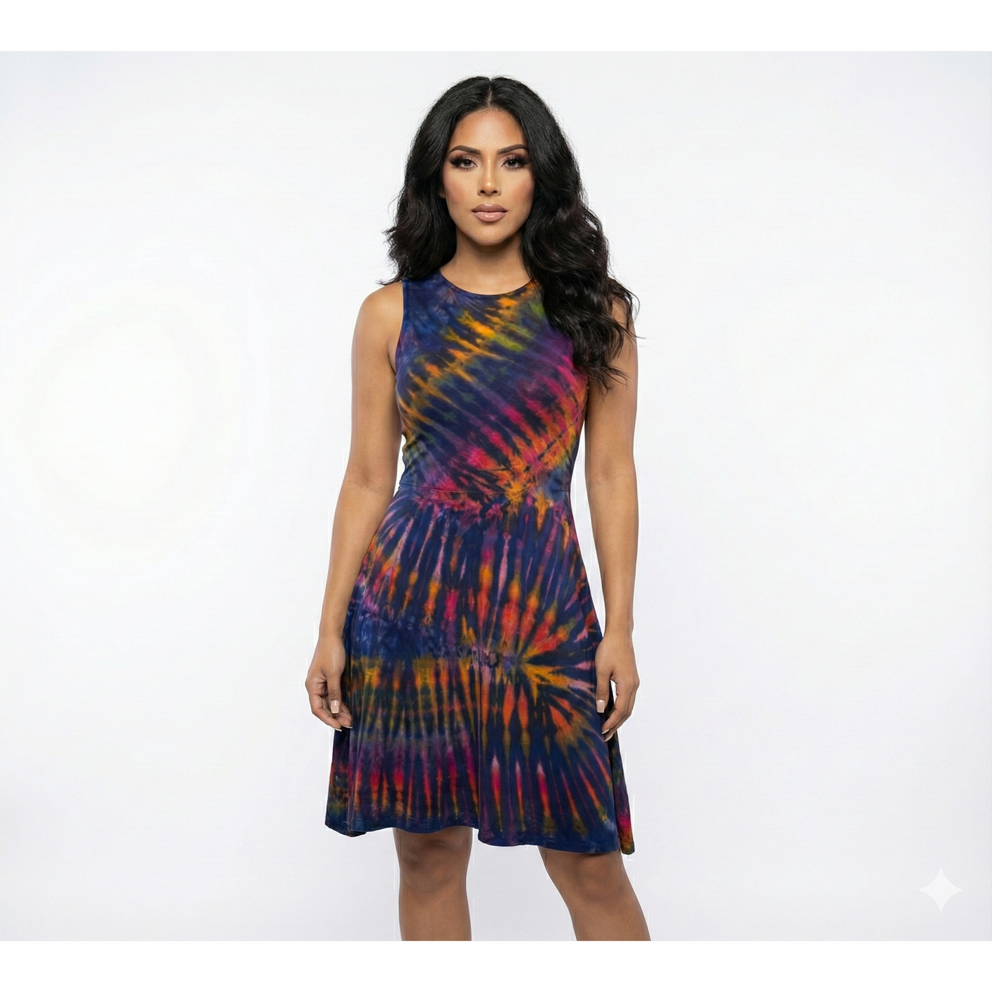 Woman wearing a tie-dye dress on a white background