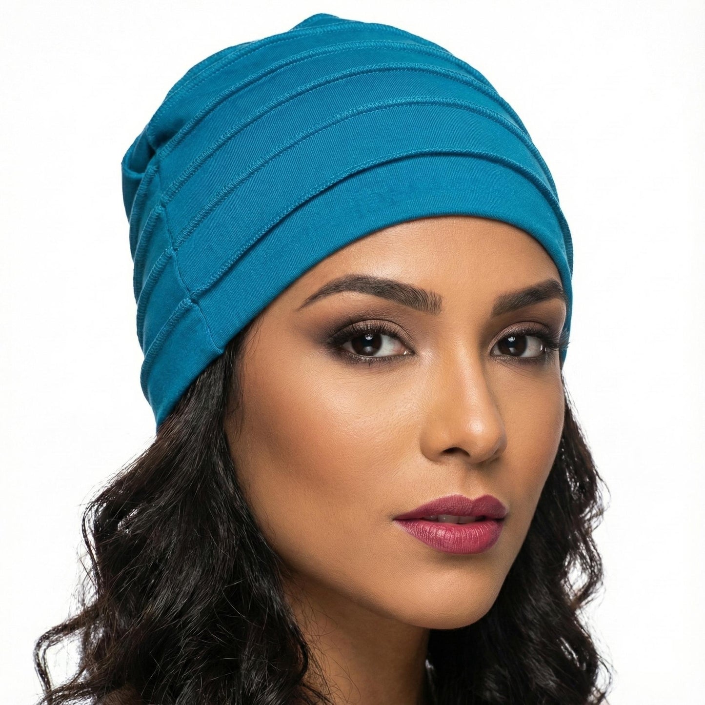 Woman wearing a blue hat on a white background-Sanjules