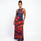 Woman wearing a tie-dye dress on a white background