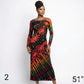 Model wearing a tie-dye dress with long sleeves on a white background