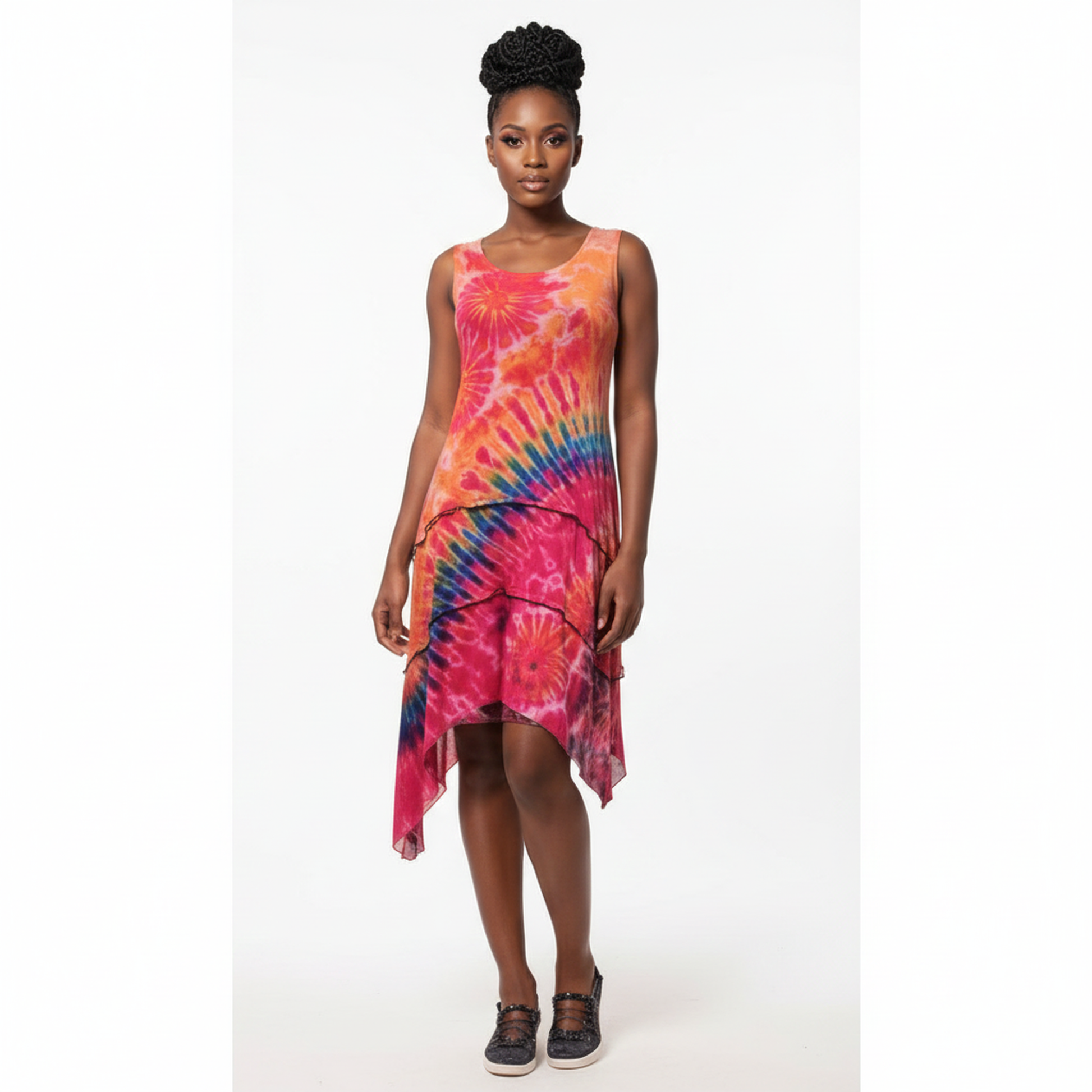 Woman wearing a tie-dye dress on a white background