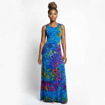 Woman wearing a tie-dye dress on a white background