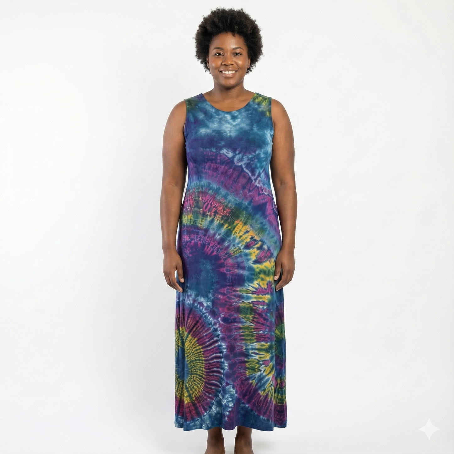 Woman wearing a tie-dye dress on a white background