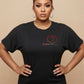 Women's black combed cotton t-shirt with "BLACK LIVES MATTER" and a raised fist in red and green rhinestones.