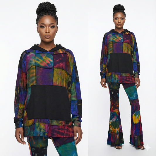Multicolored tie-dye hoodie and pants worn by a model on a white background