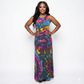 Woman wearing a tie dye dress on a white background