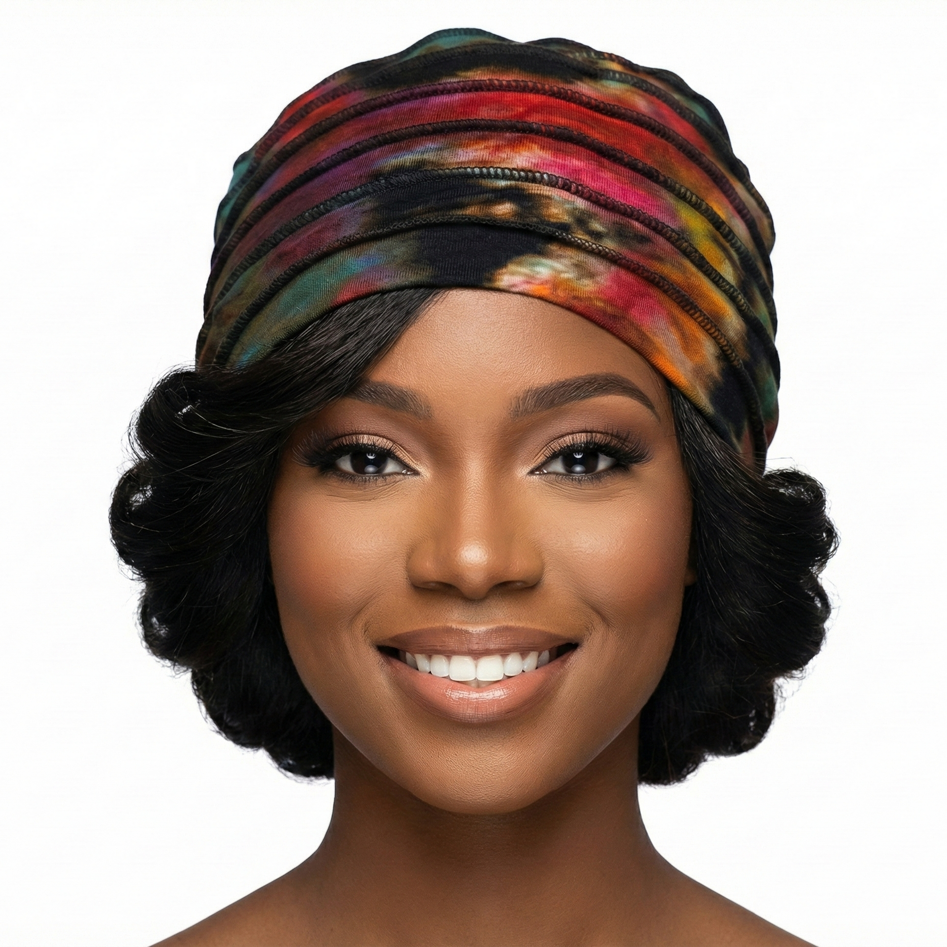 Woman wearing a tiedye hat on a white background