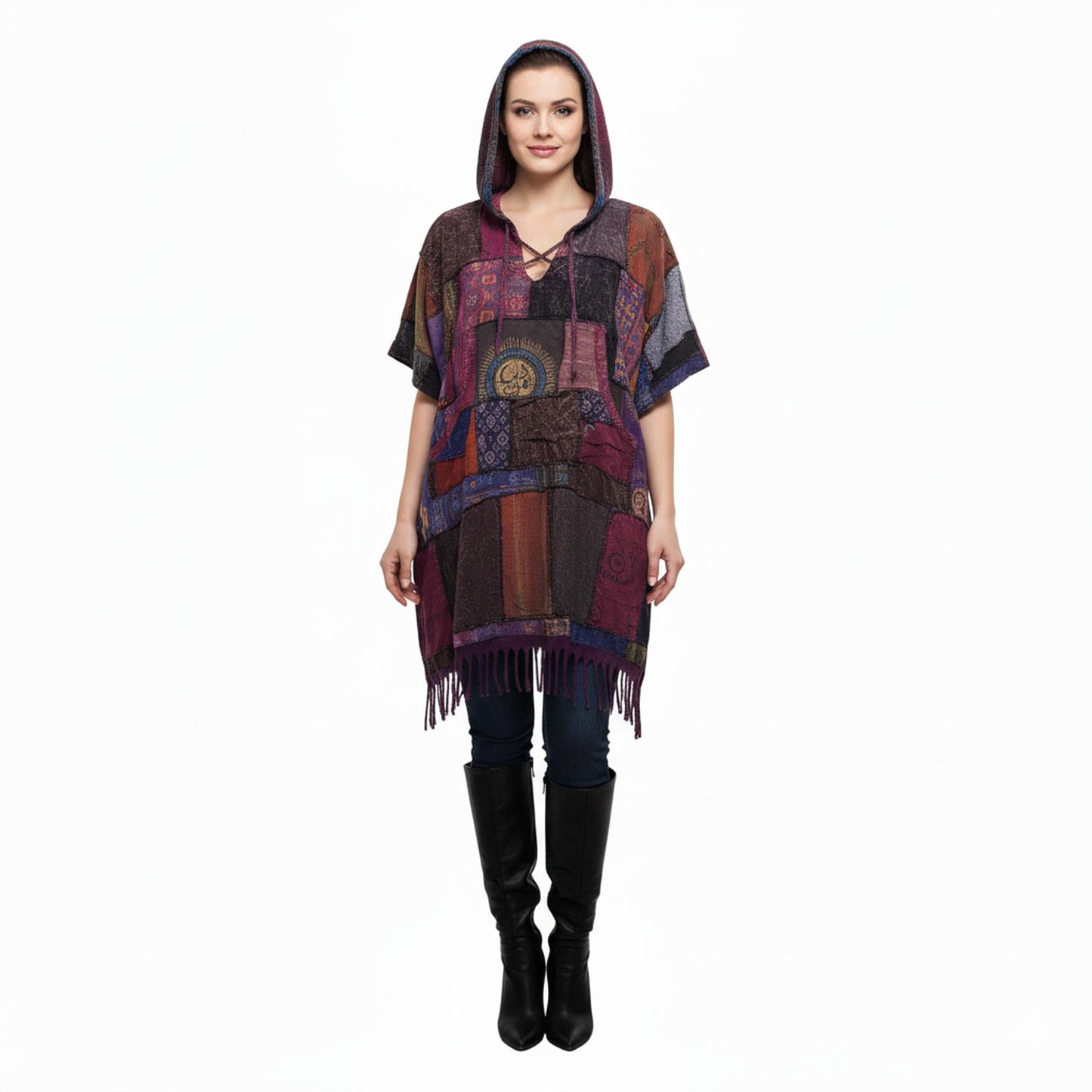 Woman wearing a colorful patchwork  poncho on a white background