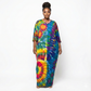 Woman wearing a tie-dye dress on a white background