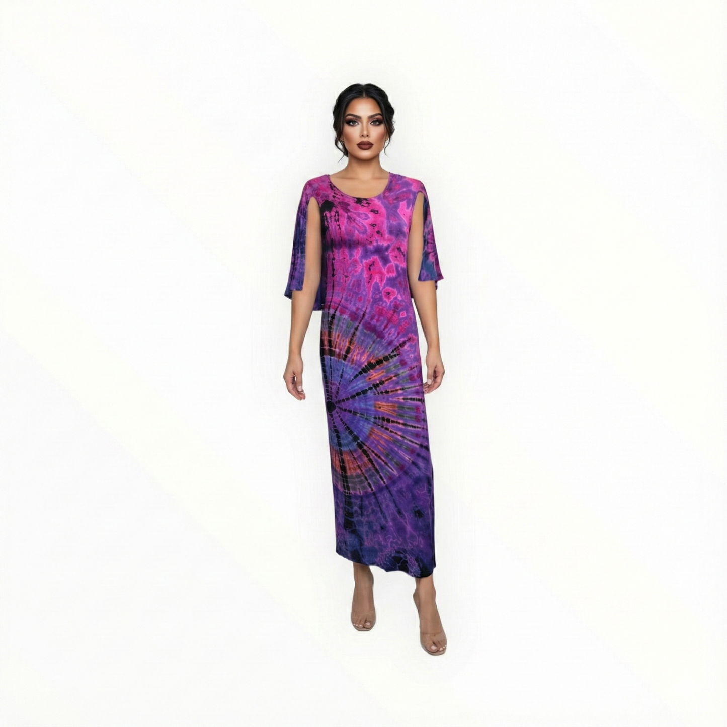 Woman wearing a purple and pink tie-dye dress on a white background