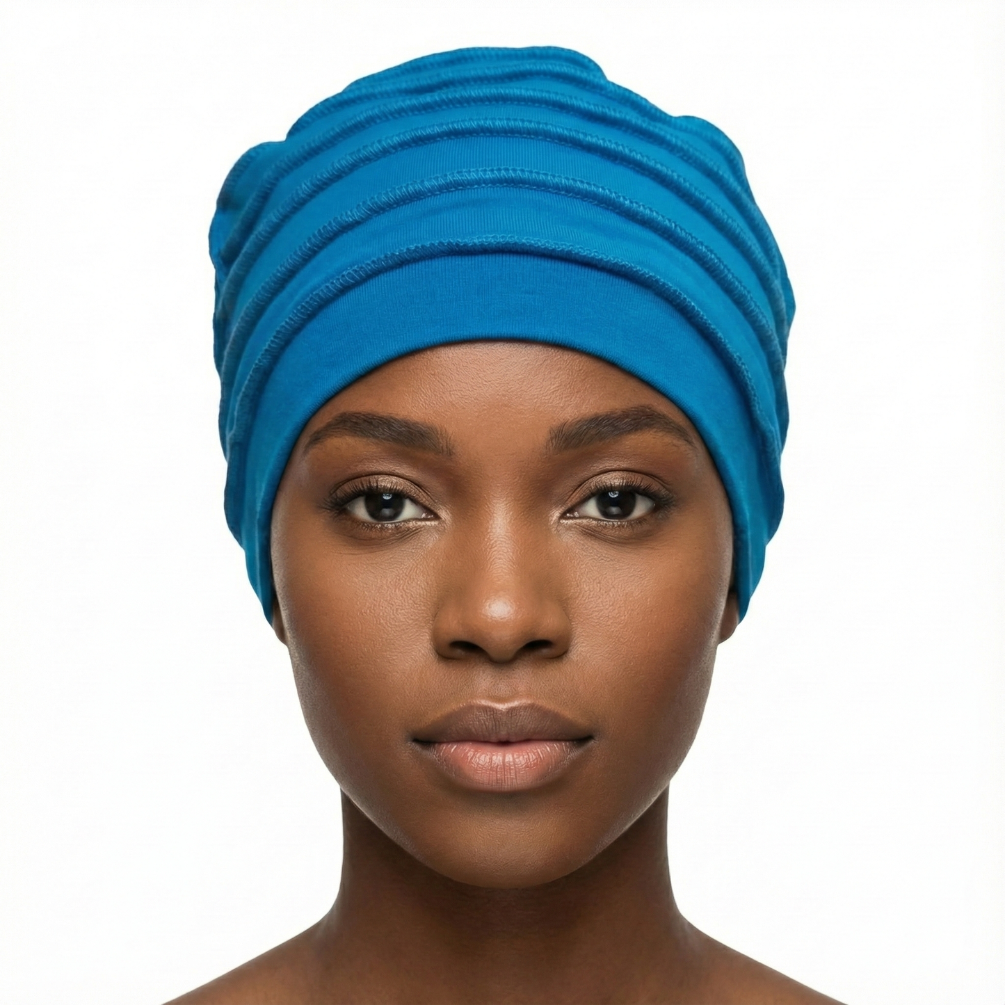 Woman wearing a blue hat on a white background