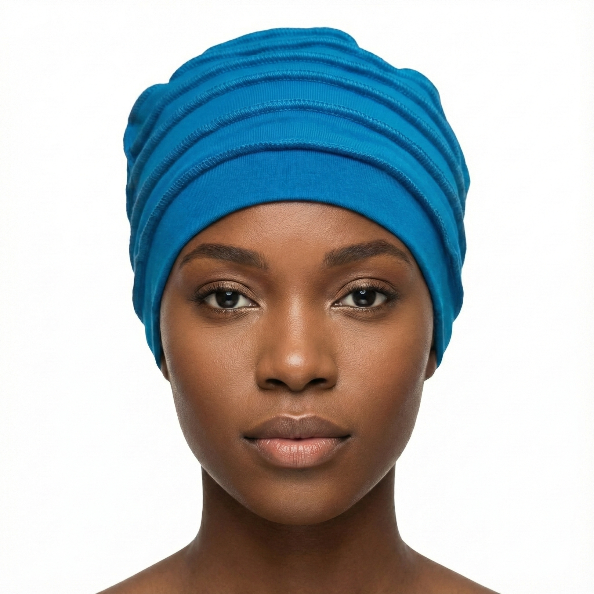 Woman wearing a blue hat on a white background