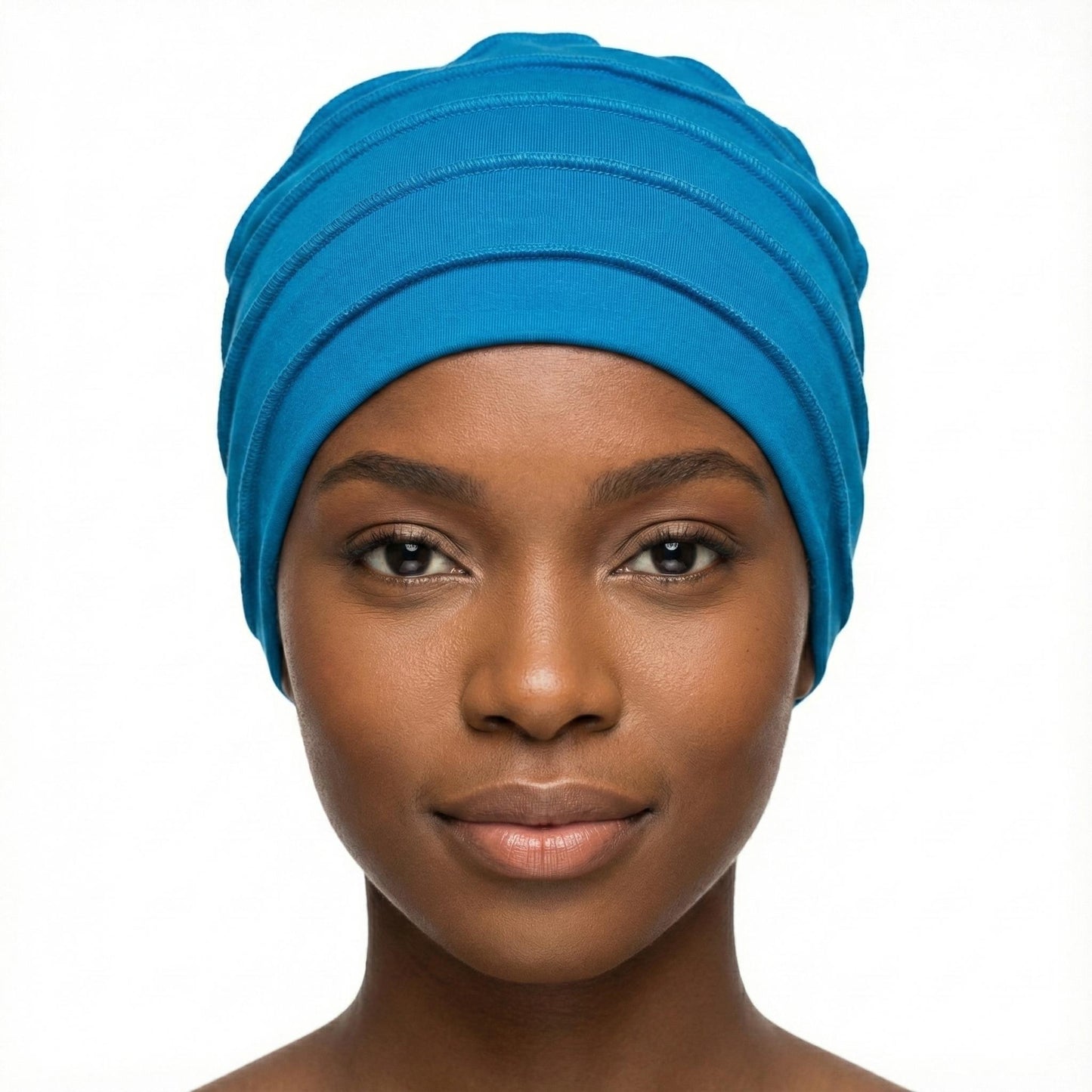 Woman wearing a blue hat on a white background-Sanjules