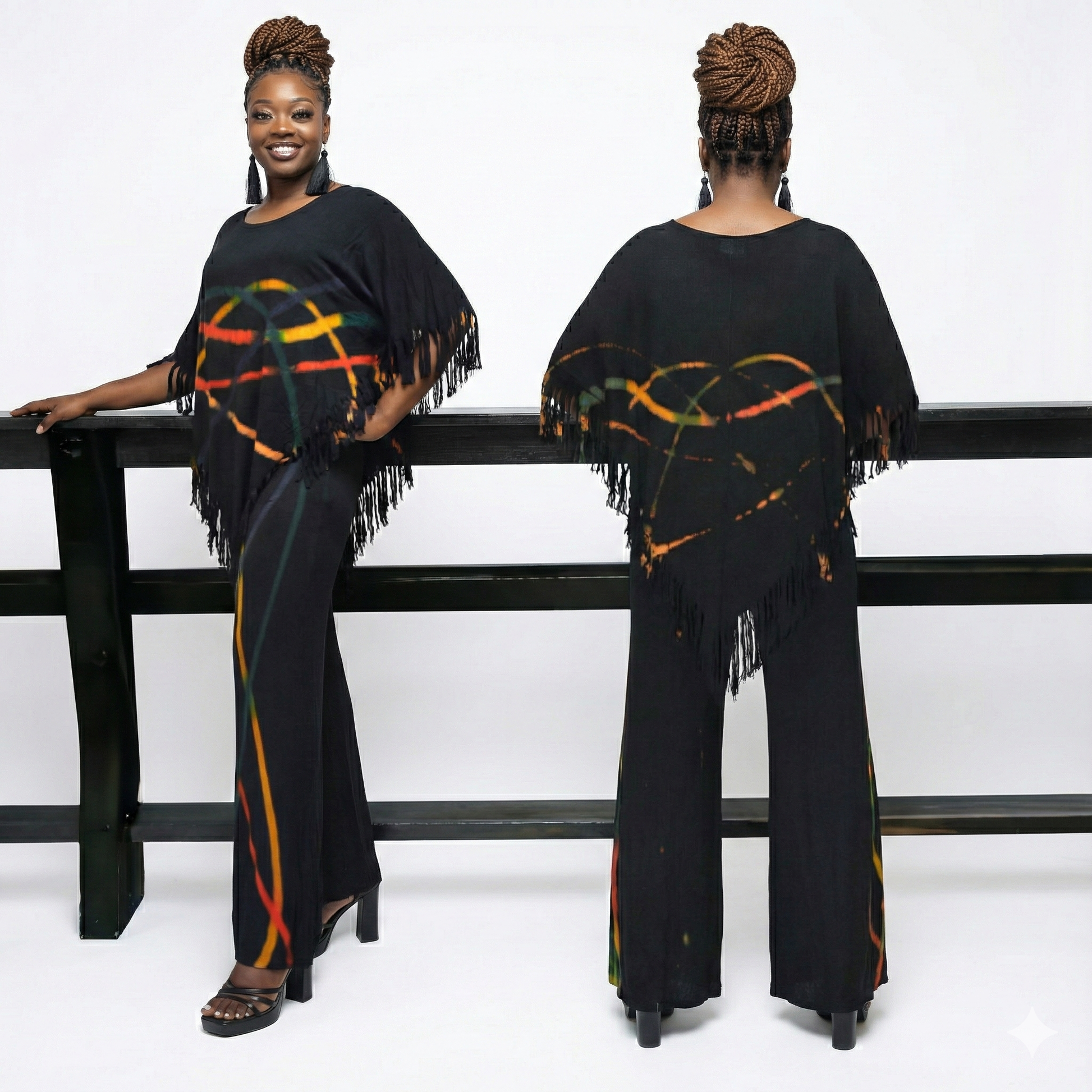 Woman wearing a black outfit with colorful patterns and fringes,