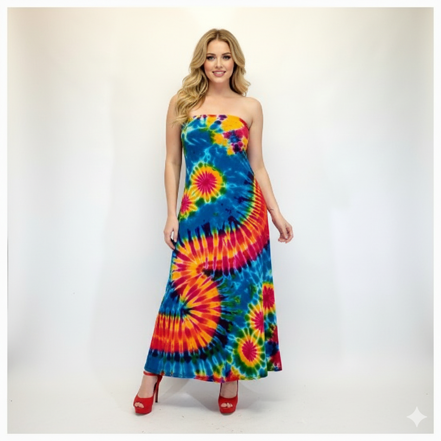 Woman wearing a colorful tie-dye strapless dress on a white background