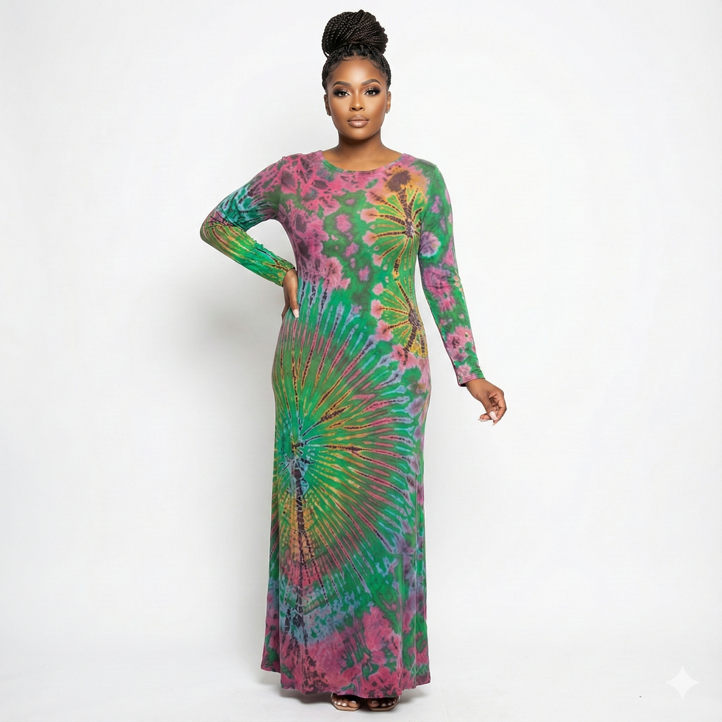 Woman wearing a colorful tie-dye dress on a white background