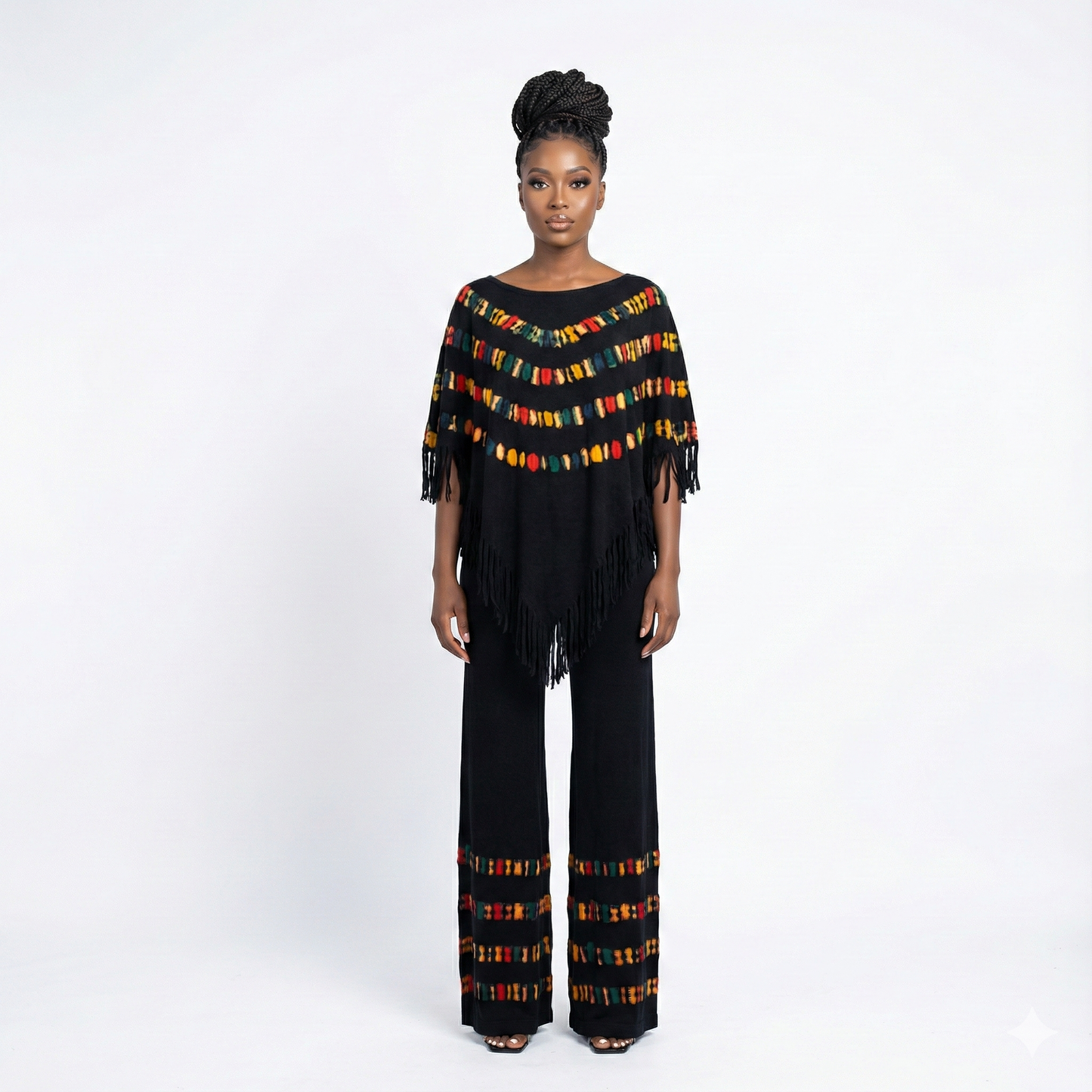 Woman wearing a colorful poncho with fringe on a white background