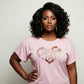 Woman in a pink I Love Chocolate rhinestone t-shirt with pearl oval stones and reflective film.