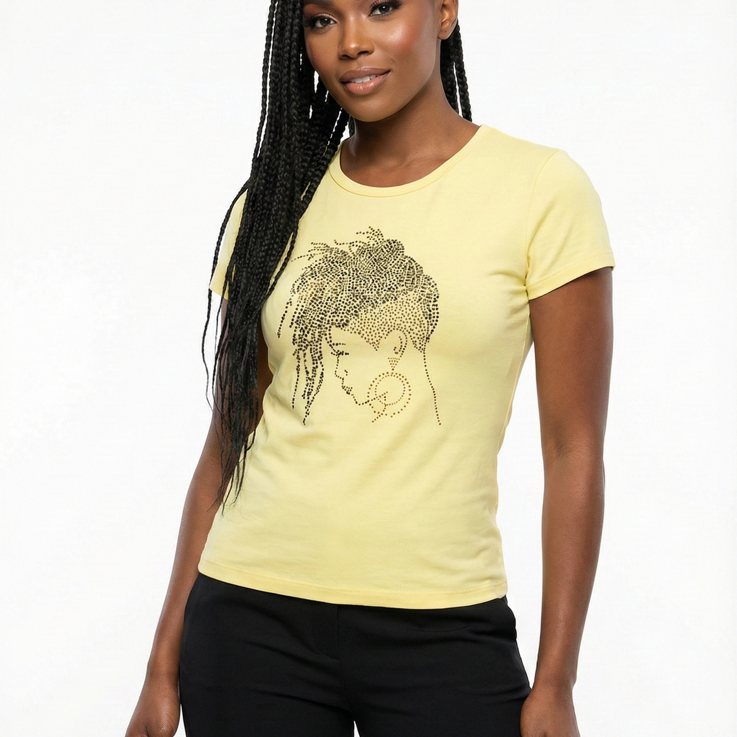Woman in a fitted yellow cotton t-shirt with a sparkling rhinestone loc design.