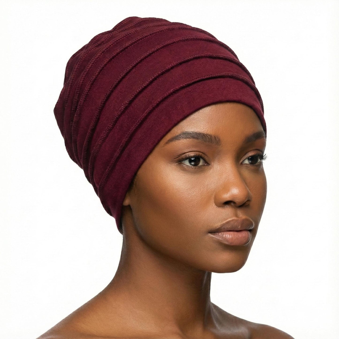 Woman wearing a burgundy hat on a white background-Sanjules
