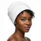 Woman wearing a white hat on her head against a white background-Sanjules