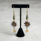 Kenyan brass, cowrie shell, and bone drop earrings with colorful beads and gold accents 