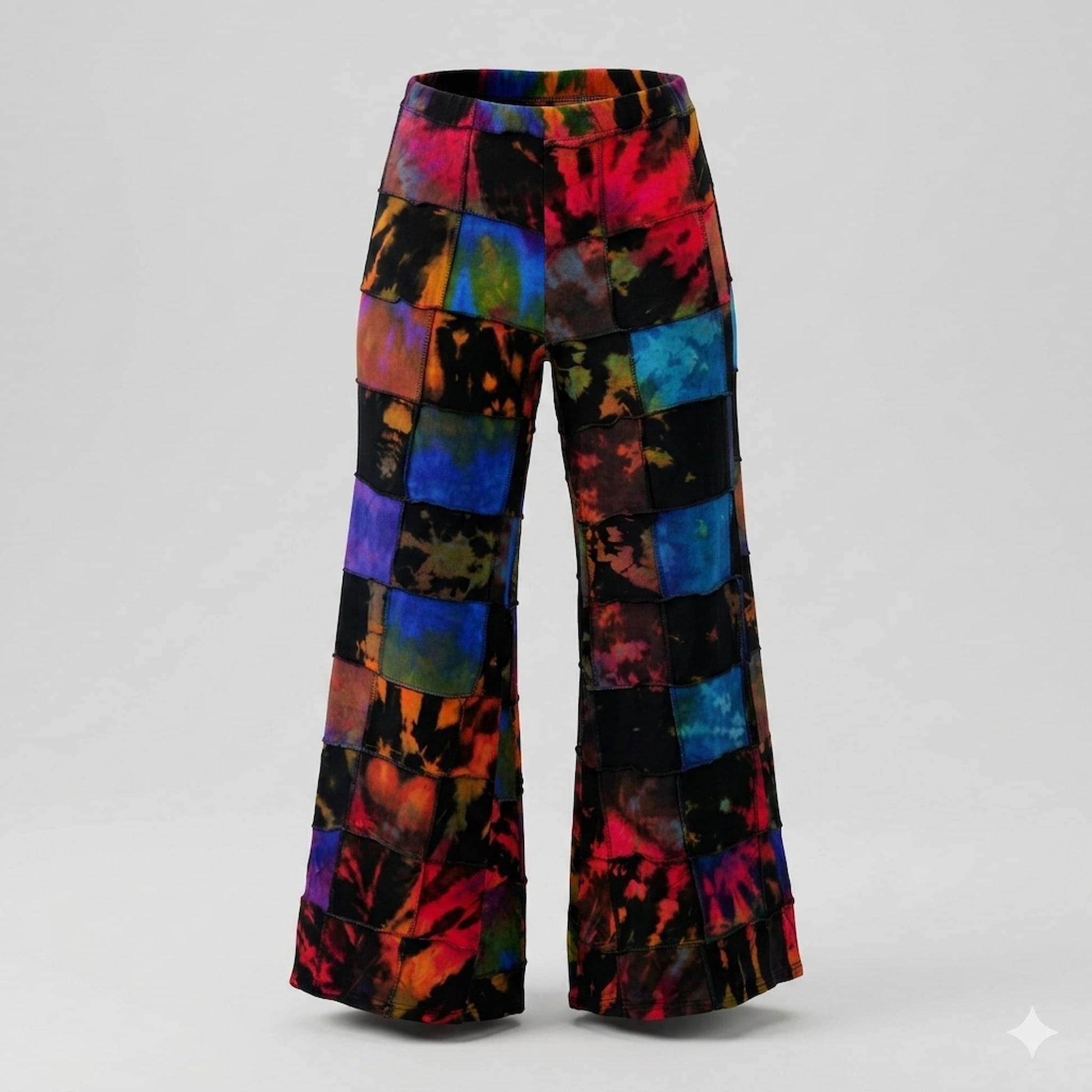 Colorful patchwork tie-dye pants on a gray background