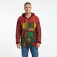 Man wearing a multicolored patchwork hoodie on a white background