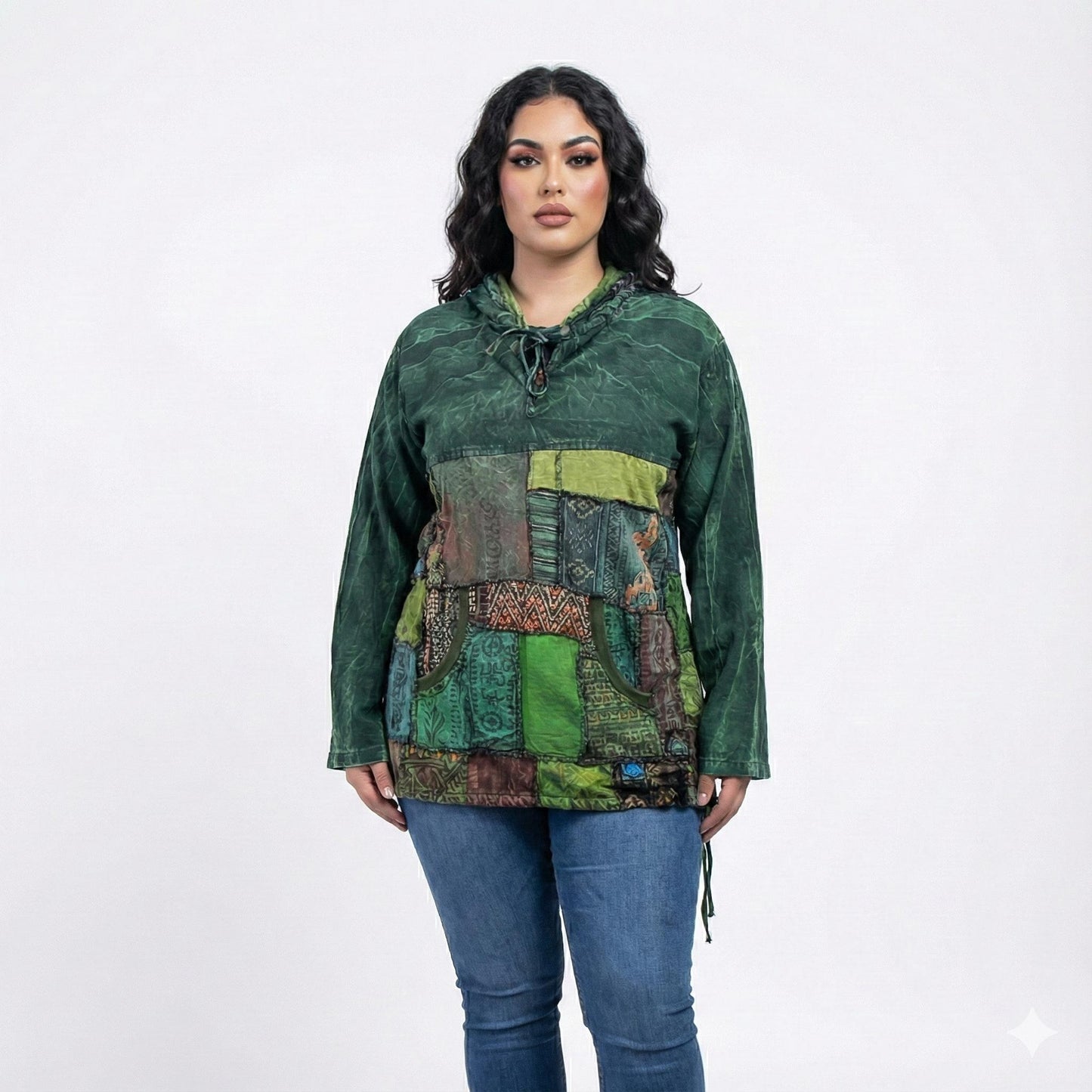 Woman wearing a patchwork hoodie with a white background