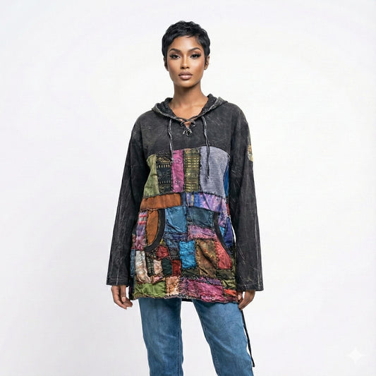 Woman wearing a patchwork hoodie with a white background